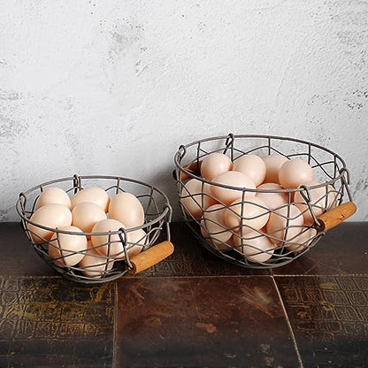 CVHOMEDECO. Round Wire Egg Baskets Rustic Fruit Baskets with Wooden Handles Primitives Vintage Collecting Basket. Rusty, Set of 2
