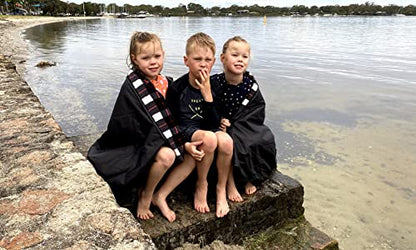 DOWN UNDER OUTDOORS Waterproof 350 GSM Fleece or Sherpa Stadium Blanket | Large Extra Thick, Windproof, Quilted, Machine Washable, Camping Picnic & Outdoor, Beach, Dog, secret pocket, 82 x 55 inches - color: Black & White Check
